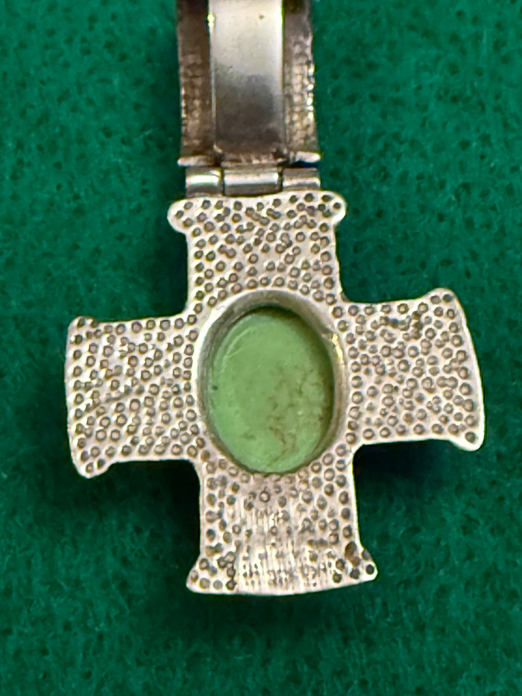 Vintage cross pendant with green stone