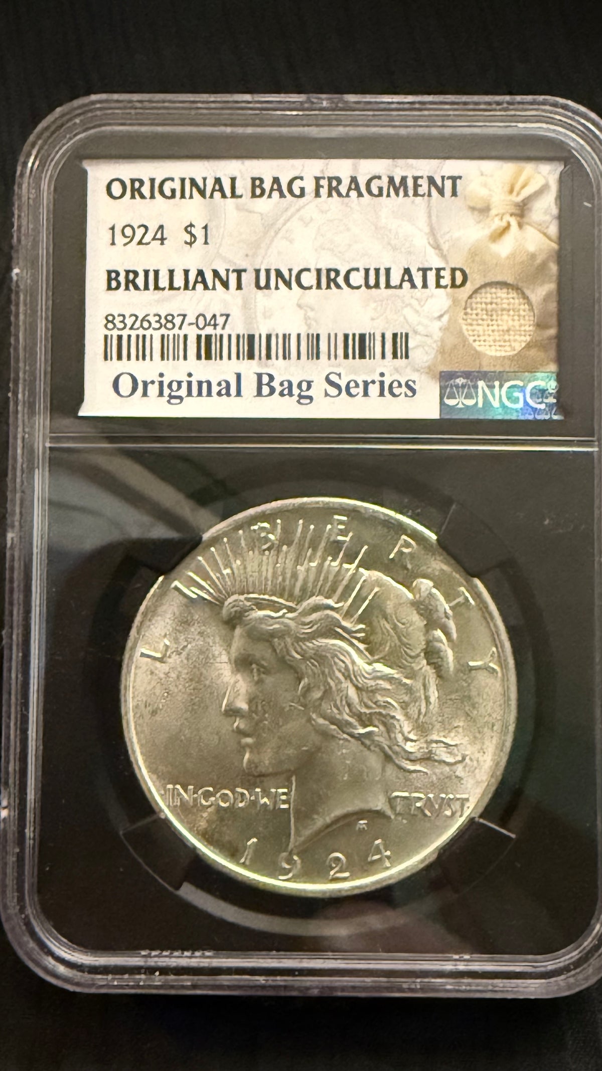 1924 Peace Silver Dollar NGC Brilliant Uncirculated – Original Bag Fragment Series