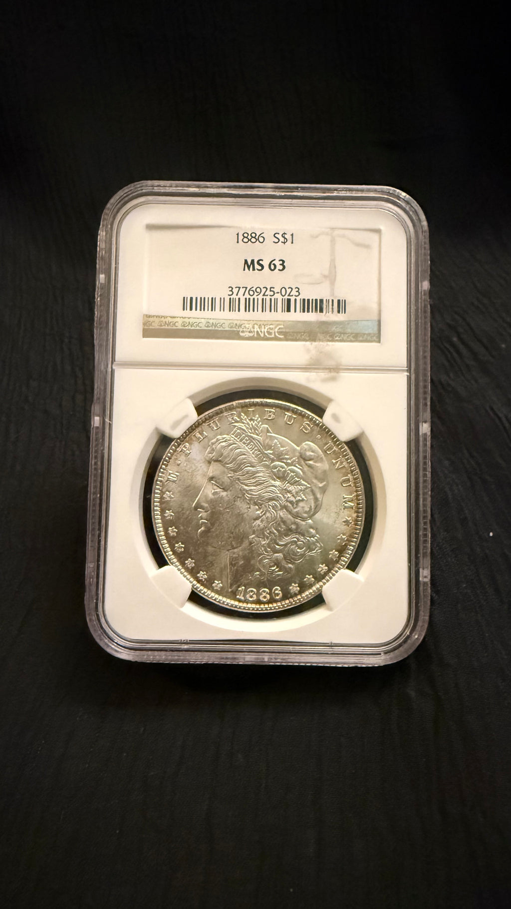 1886 Morgan Silver Dollar — NGC MS63 — Attractive Toning